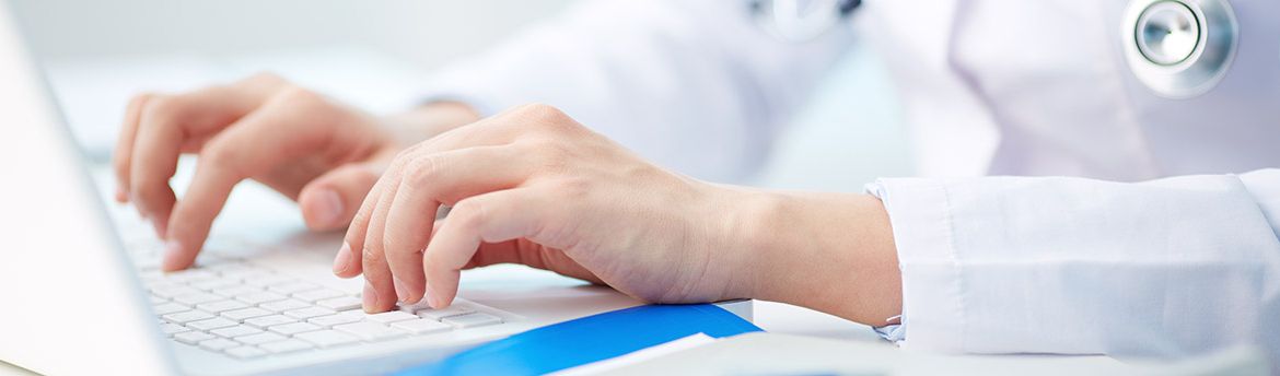 Medical person typing